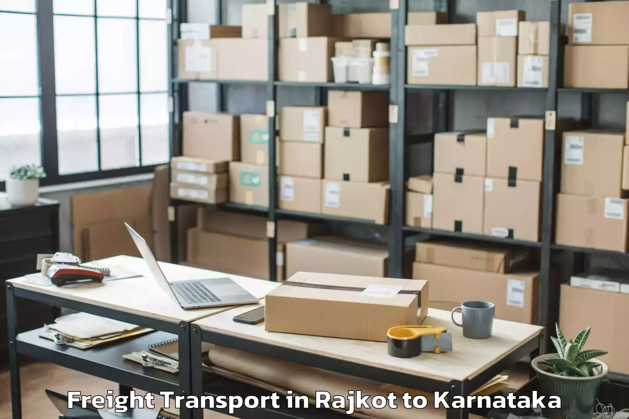 Top Rajkot to Karnataka Janapada Vishwavidya Freight Transport Available